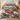 Christmas Tree Farm Red Truck comforter set with 2 matching pillowcases on a bed in a festive bedroom