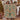 Holding a personalized Christmas Tree of Life woven blanket with custom family name woven in