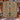 Christmas Tree of Life woven blanket displayed by a snowy window ledge