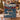 Couple holding a personalized Christmas tree schooner woven blanket with custom name woven in