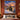 Christmas tree ship woven blanket displayed as a Christmas wall tapestry above a bed