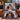 Christmas Winter Walk two photo fleece blanket with dog photos draped over a leather sofa