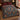 Circling Koi Maple Medallion woven blanket spread on a bed with koi and maple leaf design