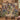 Couple holding a personalized Clematis Garden Door woven blanket with custom family name