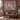 Couple holding a personalized Clematis Pergola Heritage Pattern woven blanket with custom family name