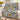 Cobalt Sunflower Highland Cows woven blanket draped over a sofa