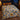 Cobalt Sunflower Highland Cows woven blanket spread on a bed