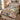 Cobalt Tulip Market Trellis quilt bedding set with 2 matching pillowcases on a made bed