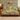 Copper Fox Fernwood woven blanket draped over a sofa