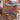 Holding a personalized cranberry bog woven blanket with custom name woven in