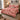 Cranberry Christmas Cactus Story quilt bedding set with 2 matching pillowcases on a bed with Christmas decor