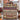 Holding a personalized cranberry harvest sampler woven blanket with custom name woven in