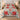 Crimson Solstice Poinsettia comforter set with 2 matching pillowcases on a bed
