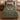 Dancing crane courtship woven blanket spread on a bed
