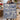 Couple holding a personalized Delft Blue Amaryllis Garden woven blanket with custom names in a kitchen
