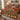 Desert Bloom Saguaro Christmas quilt bedding set with 2 matching pillowcases on a bed with Christmas decor