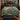 Dragonfly Rush Pool Heritage Pattern woven blanket with custom family name spread on a bed