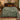 Elderflower Lime Heritage Pattern woven blanket with custom family name spread on a bed