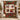 Personalized evergreen family heirloom album photo blanket with four photos displayed on a wall