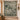 Evergreen Reindeer Herd woven blanket displayed as a wall tapestry above a bench
