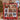 Holding a personalized Fair Isle Christmas photo blanket with custom family name