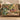 Fig Harvest & Butterfly Garden woven blanket draped over a sofa