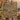 Holding a personalized Forest Floor Cabin Creek woven blanket with custom family name woven in