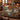 Foxhound Weeping Beech Lake woven blanket draped over a sofa, living room view