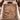 Gingerbread Christmas Baking woven blanket spread on a bed with burgundy pillows