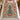Gingerbread Christmas tree woven blanket spread across a bed
