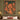 Gingerbread Icing Village woven blanket displayed as a wall tapestry above a bed with a sage green wall