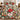 Personalized Glasshouse Poinsettia Noel comforter set with custom family name and 2 matching pillowcases, flat lay