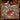 Couple holding a personalized Glasshouse Poinsettia Noel Christmas woven blanket with custom family name
