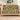 Golden Leopard Botanical Floral woven blanket draped over a sofa, living room view