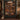 Personalized Gothic Curio Cabinet photo blanket displayed on a wall in a library room
