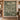Green Cream Red Deer Christmas woven blanket displayed as a wall tapestry in an entryway
