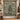 Green Cream Woodland Christmas woven blanket displayed as a wall tapestry in a farmhouse entryway