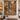 Hanukkah Lights of Jerusalem woven blanket displayed as a wall tapestry above a bench