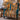 Hanukkah Lights of Jerusalem woven blanket draped over a teal velvet armchair