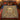 Terracotta and lapis menorah mosaic fleece blanket spread on a bed