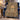 Hanukkah Mosaic of Light fleece blanket draped over a navy wingback armchair