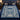 Hanukkah Papercut Menorah fleece blanket spread on a navy bed with Star of David pillow