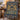 Hanukkah Twin Lions Menorah woven blanket draped over a carved wooden armchair