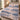 Harbor Regatta Lighthouse quilt bedding set with 2 matching pillowcases on a made bed