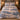 Harbor Regatta Lighthouse comforter set with 2 matching pillowcases on a bed in a warm bedroom