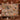 Couple holding a personalized Harvest Turkey Thanksgiving woven blanket with custom family name