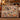 Harvest Turkey Thanksgiving woven blanket displayed in a cozy room
