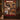 Personalized Haunted Portrait Hall photo blanket with six family photos displayed on a wall