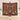 Heirloom Candlelight Conservatory woven blanket design shown without a name, held up in a bright room