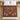 Heirloom Candlelight Conservatory woven blanket spread on a bed